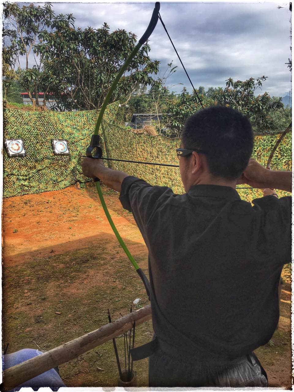 Albert Tan_2016_Photograph_by_Joshua_Shooting_an_Arrow Albert Tan Lie Sing